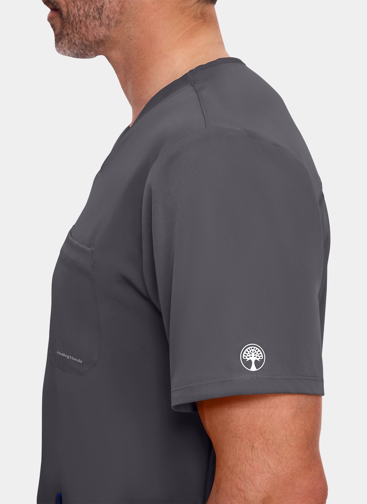 zoom sur manche d'un homme portant une blouse médicale Healing Hands Matthew étain