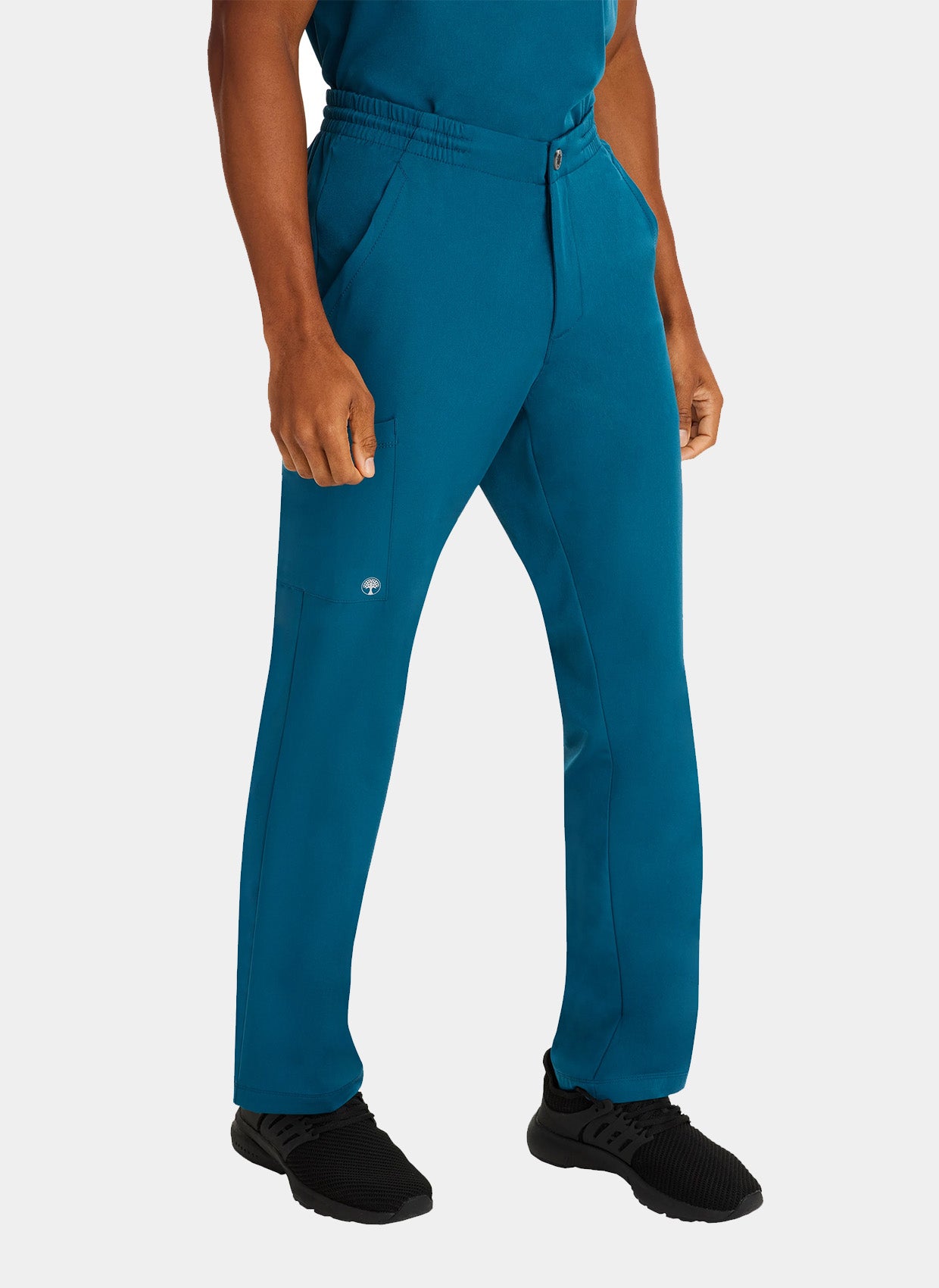 homme portant un pantalon médical Healing Hands Ryan bleue Caraïbe