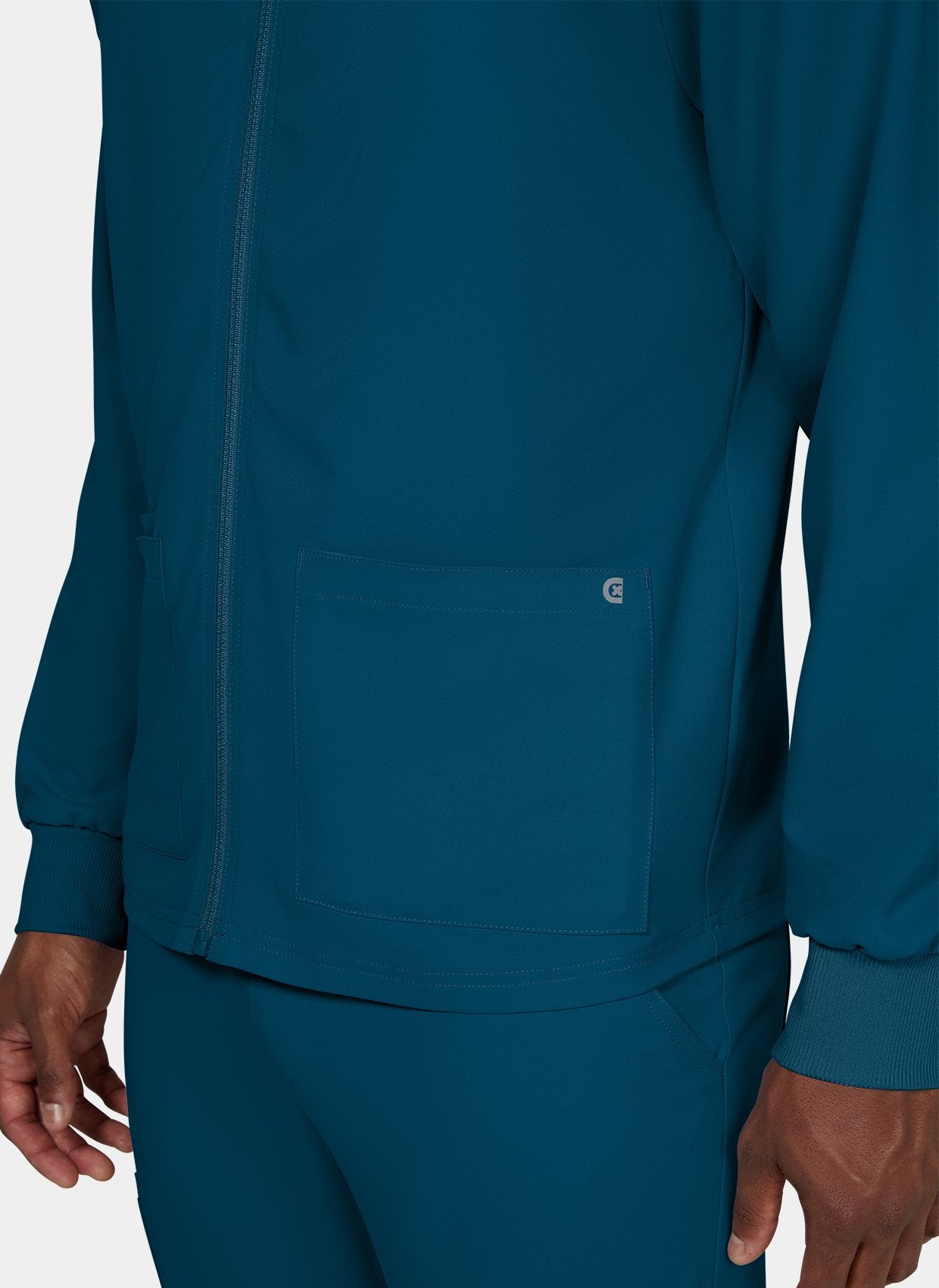 Details veste homme Koi Cureology Alpha – Bleu Caraïbes derriere