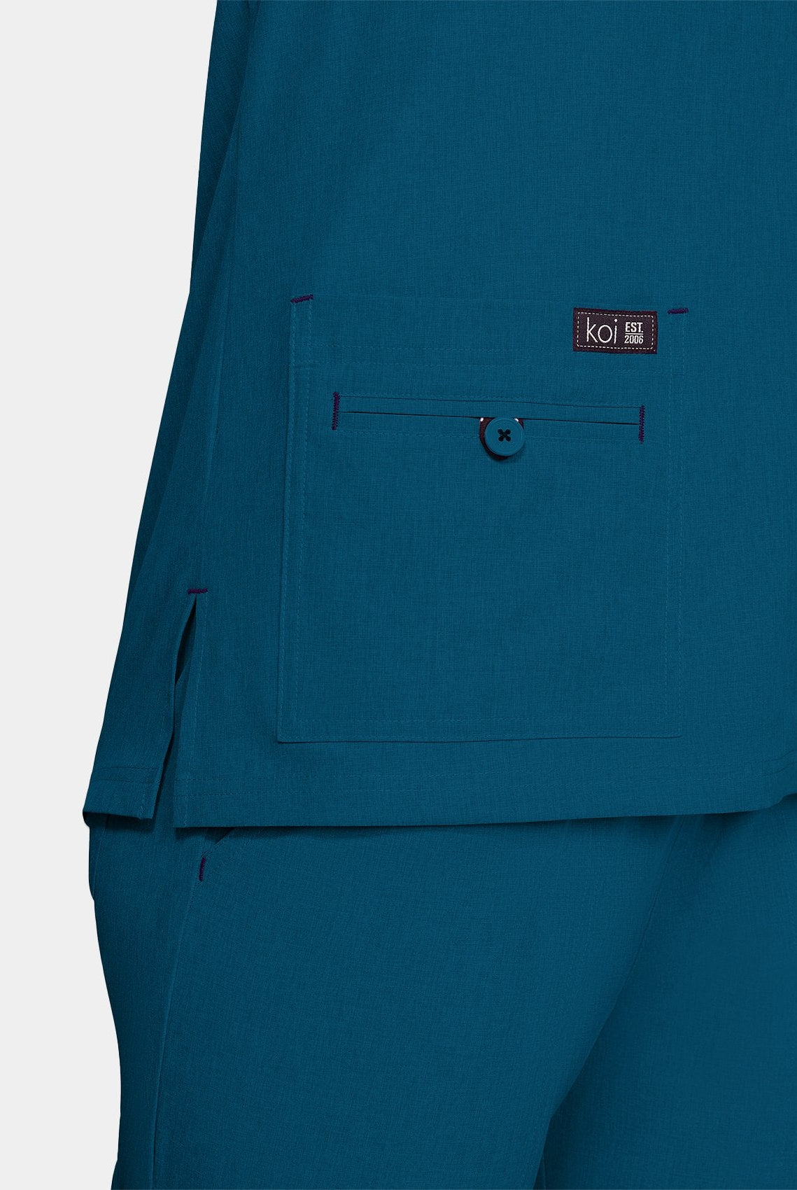 Blouse médicale femme Koi Basics Becca - Bleu Caraïbes, col en V