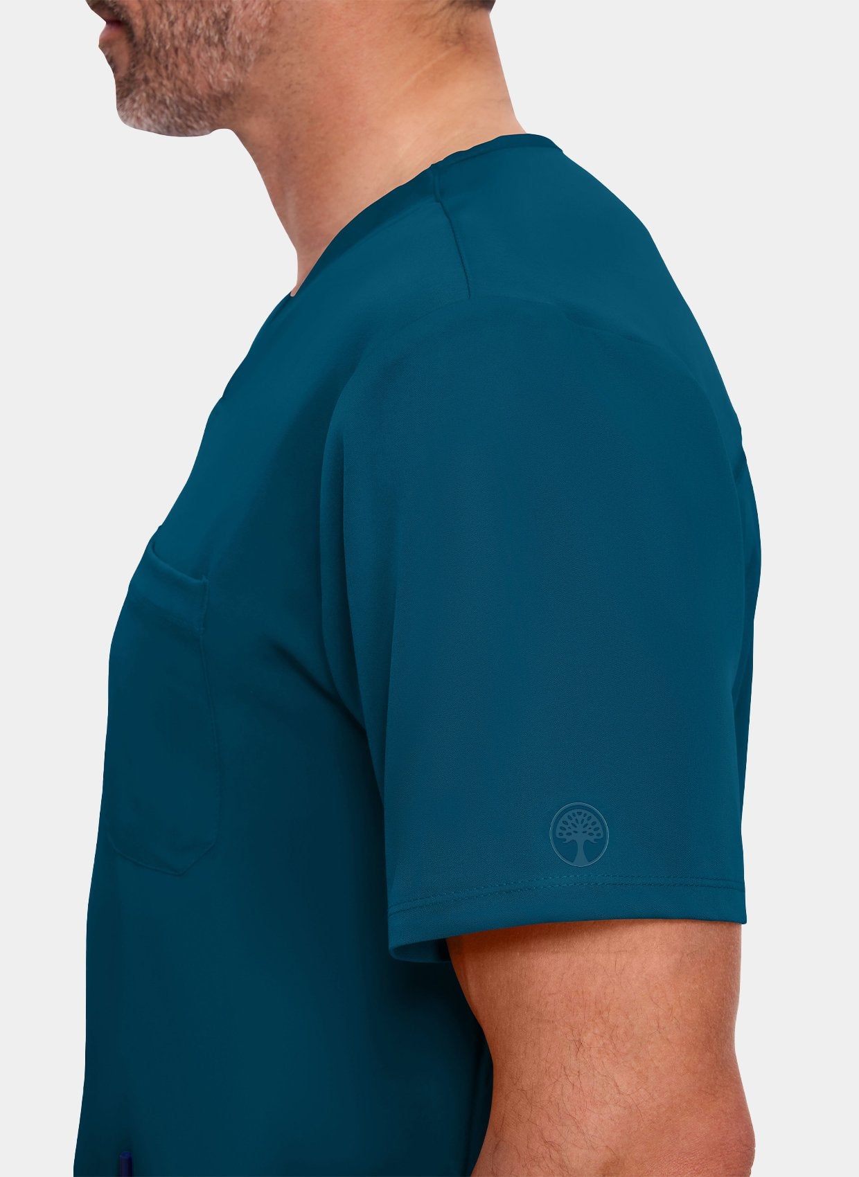 homme portant une blouse  médicale Healing Hands Matthew bleu Caraïbe de coté