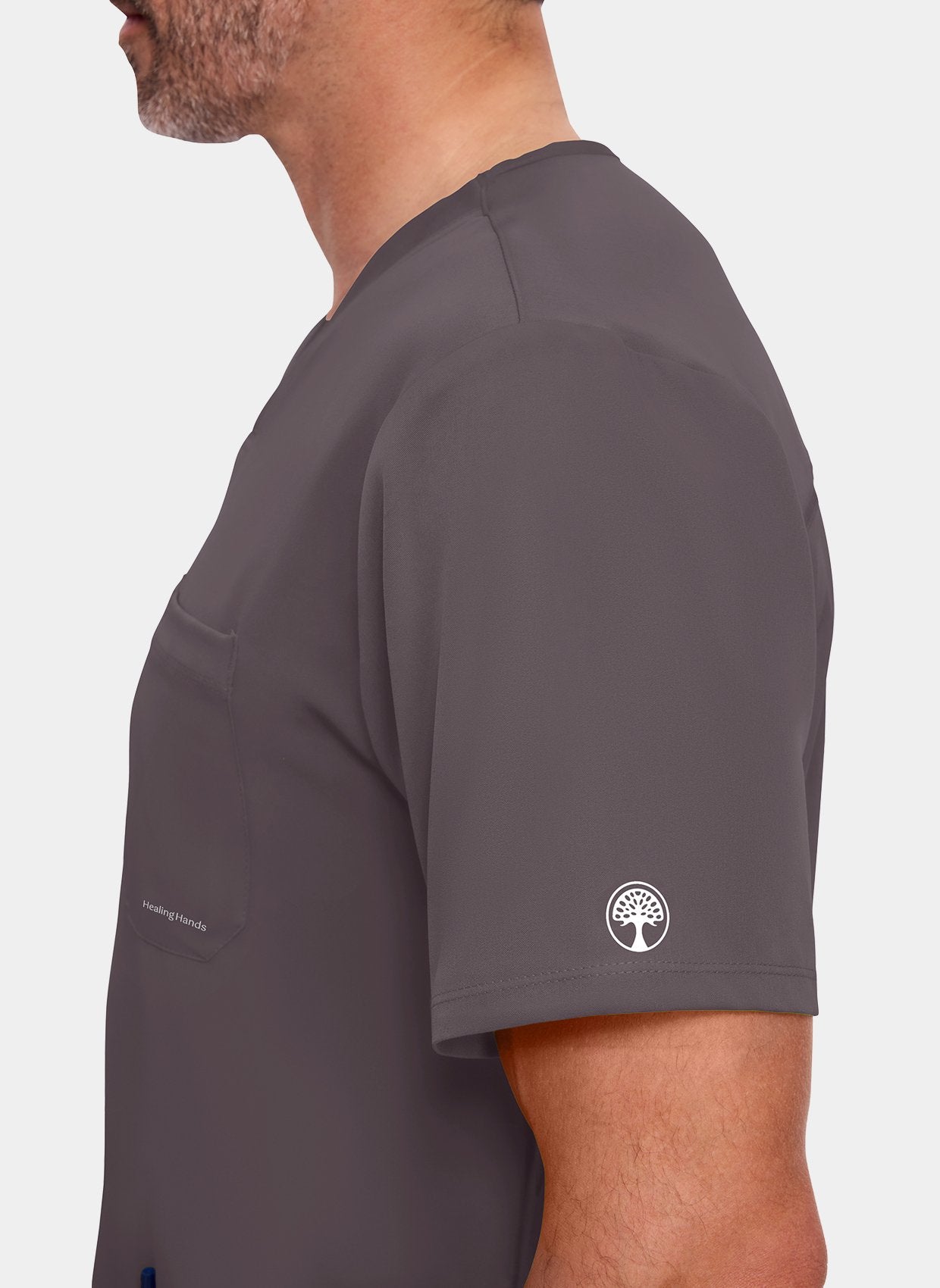 zoom sur manche d'un homme portant une blouse  médicale Healing Hands Matthew étain