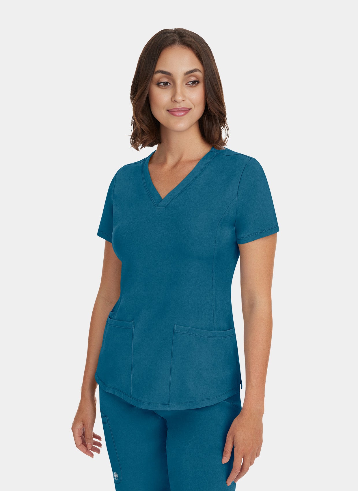 Femme portant une blouse  médicale Healing Hands Monica bleu Caraïbe 