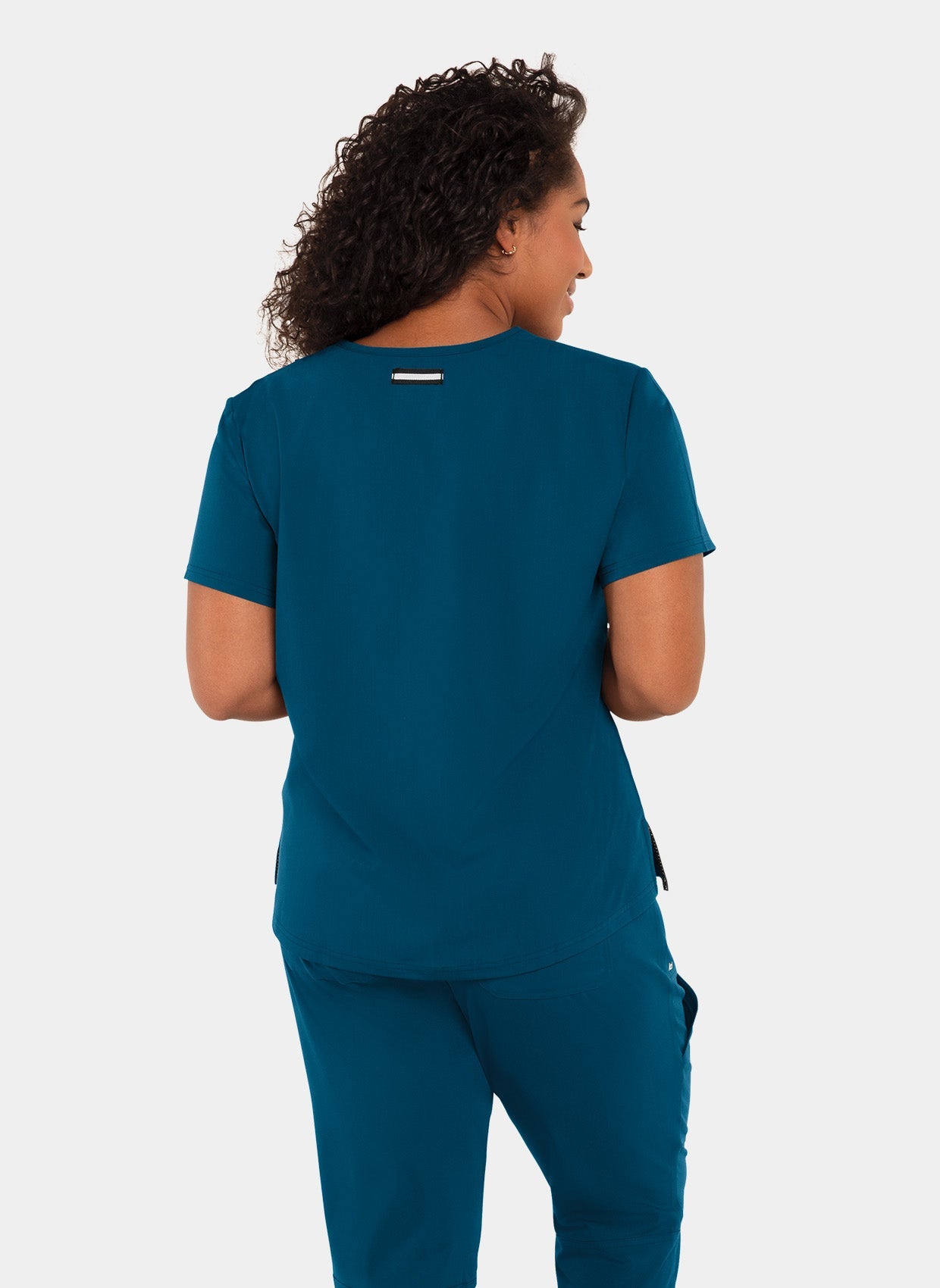 Blouse médicale femme Koi Next Gen Prête à travailler bleu Caraïbes dos