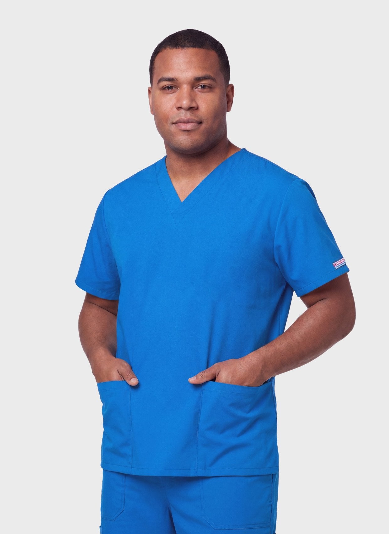 Blouse medicale origins cherokee bleu roi unisexe face