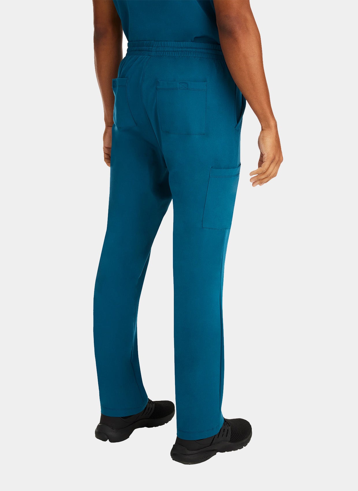 homme de dos  portant un pantalon médical Healing Hands Ryan bleue Caraïbe 