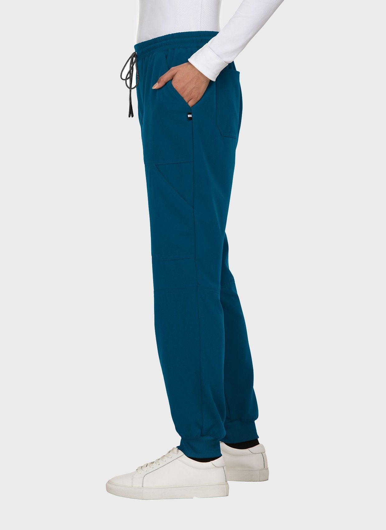 Pantalon médical femme Koi Next Gen Bonnes ondes bleu Caraïbes vue trois quarts