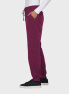 Pantalon médical femme Koi Next Gen Bonnes ondes bordeaux vue trois quarts